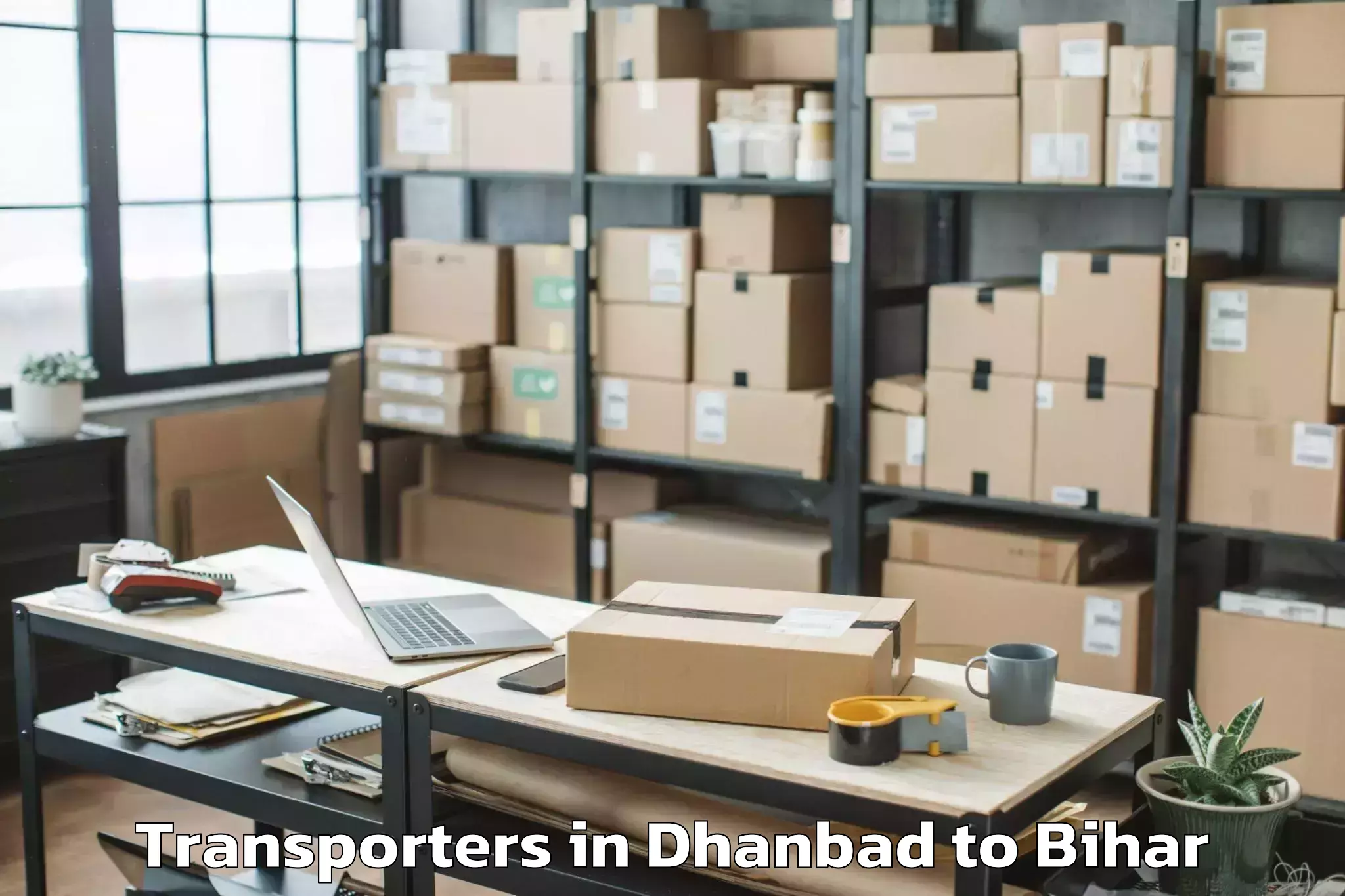 Discover Dhanbad to Charaut Transporters